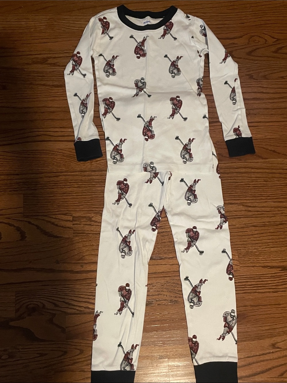 Petit Lem White Hockey Player Print Pajama Set with Black Trim